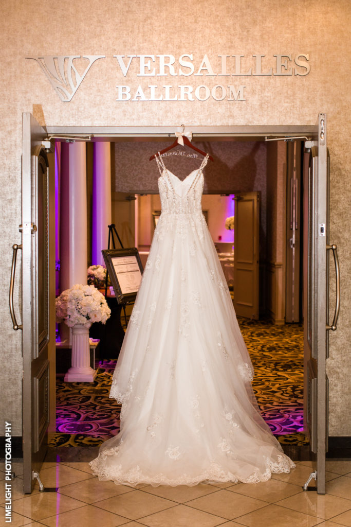 A beautiful wedding dress on display in the lobby of the Versailles Ballroom.